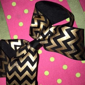 Gold and black bow